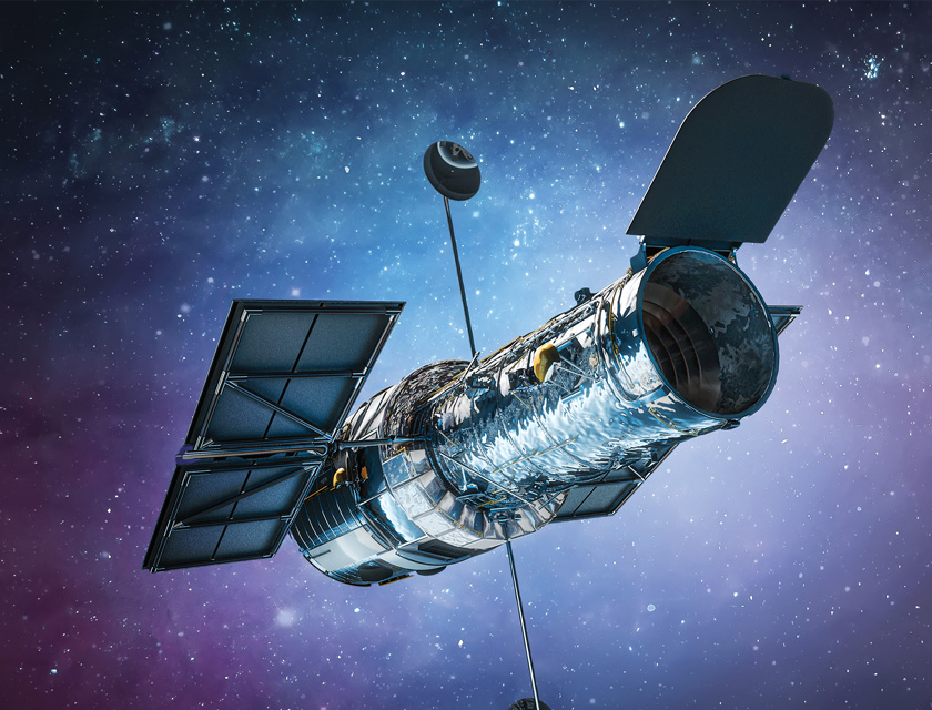 Hubble Space Telescope orbiting against a star-filled background